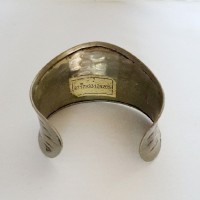 Zilverkleurige slavenarmband